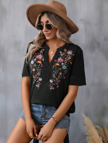 Blouse à broderies fleuries — noir