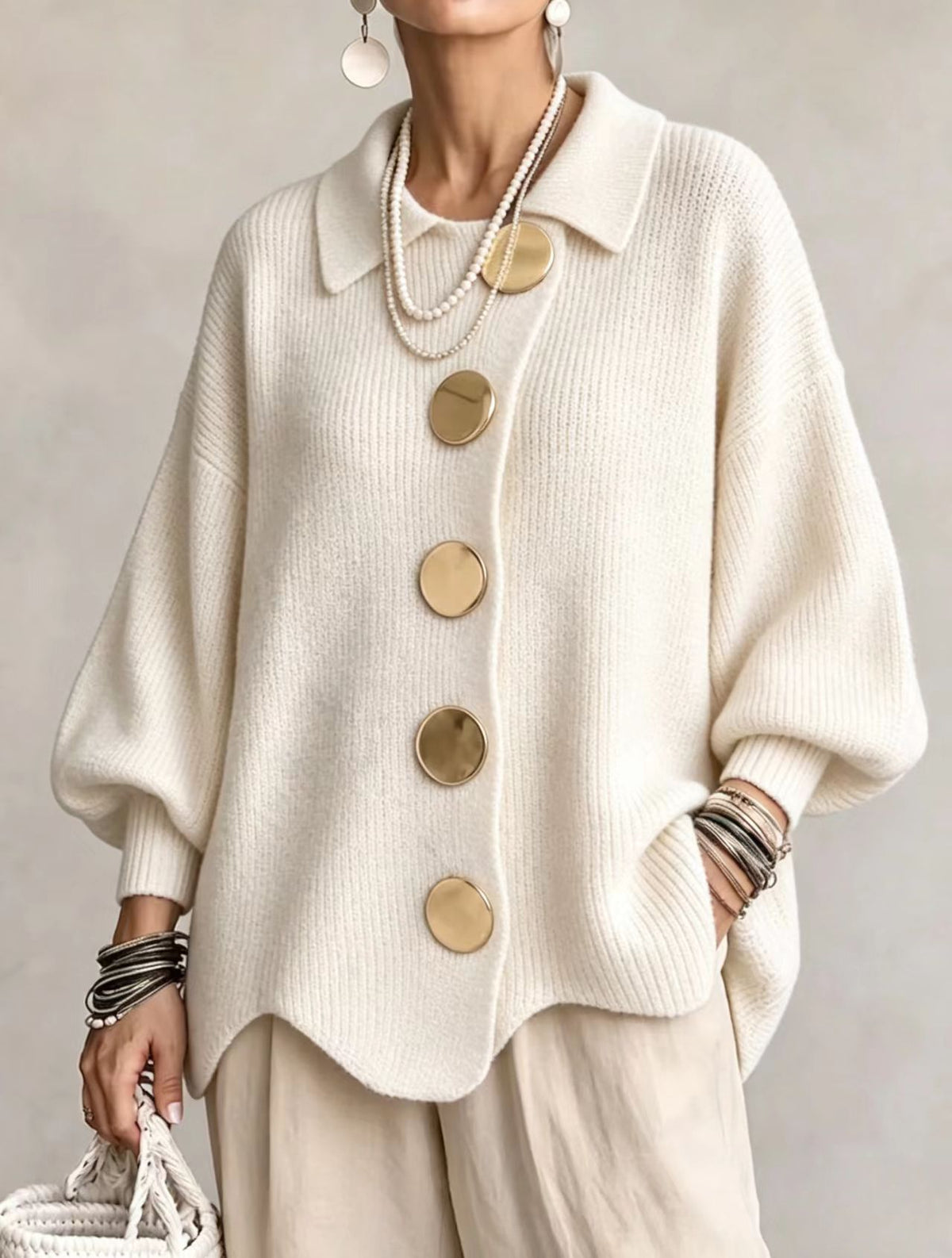 Gilet en maille à boutons dorés